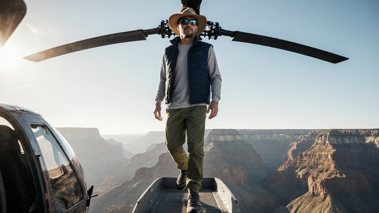 Tourist on helicopter ramp wearing layered outfit with canyon and sky background.